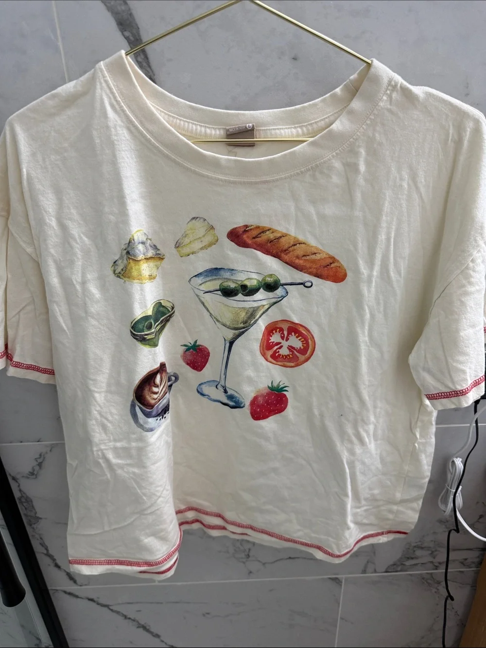Messy Bun Cream Graphic Tee with martini motif
